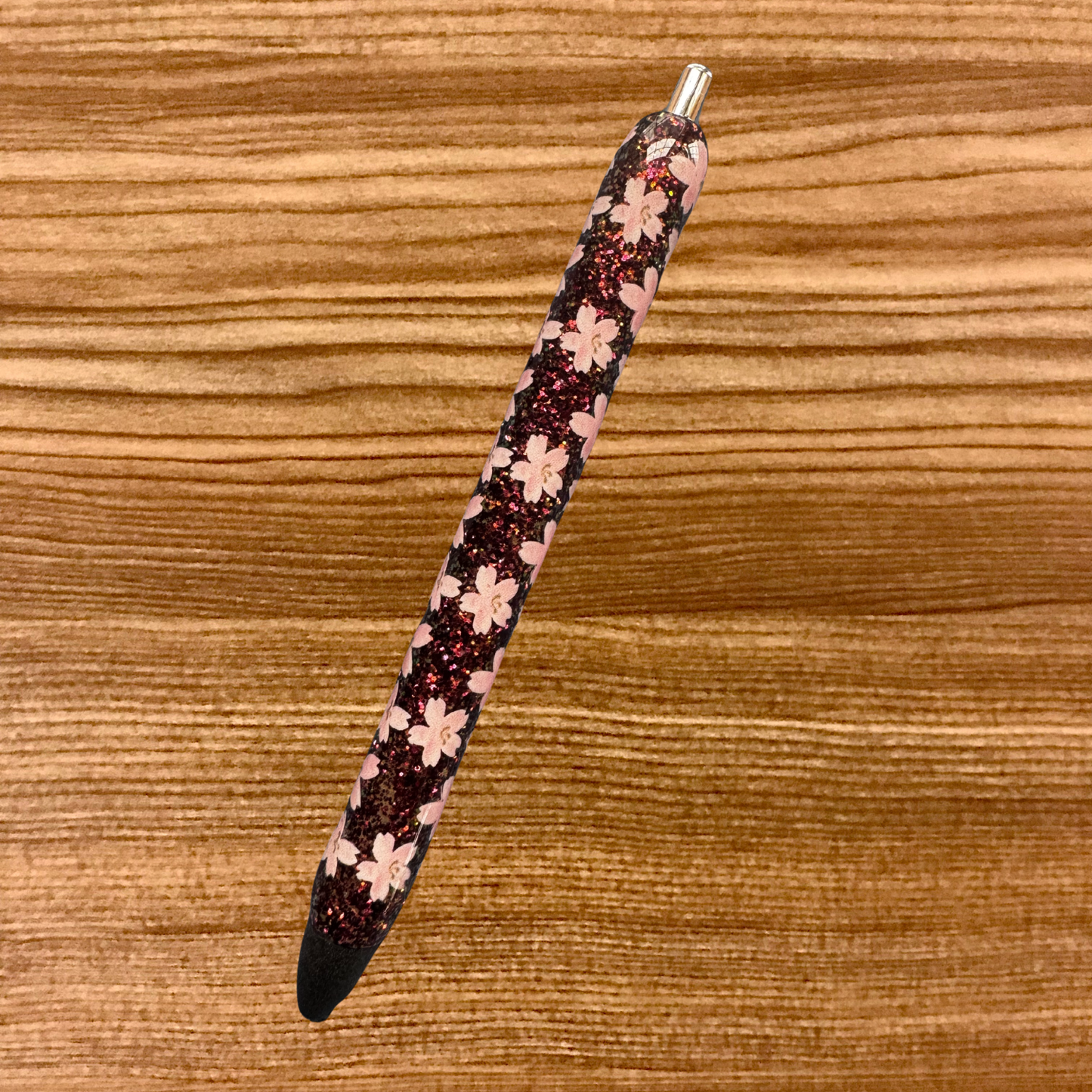 Pink flowers on multicolored glitter